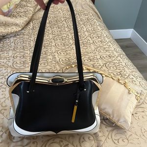 Italian purse , silverish sparkel , gold , black and white